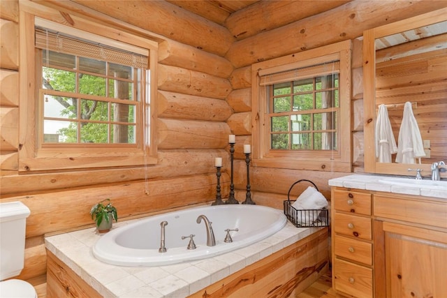 865 Toxaway Dr, Lake Toxaway, NC 28747 - full bathroom featuring toilet, a garden tub, vanity, and rustic walls