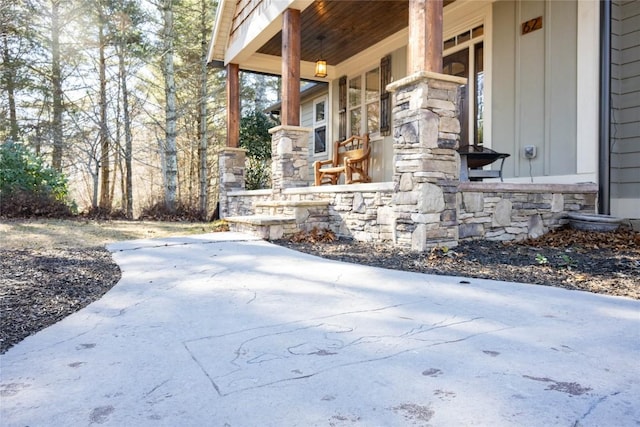 view of patio featuring a porch