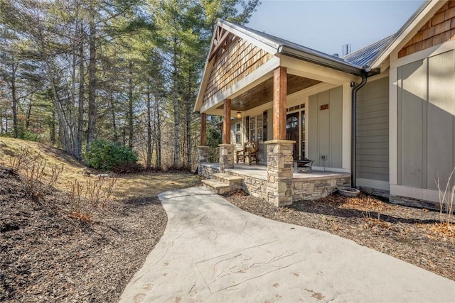 view of property exterior with covered porch