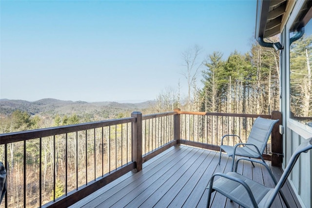 wooden terrace featuring a mountain view