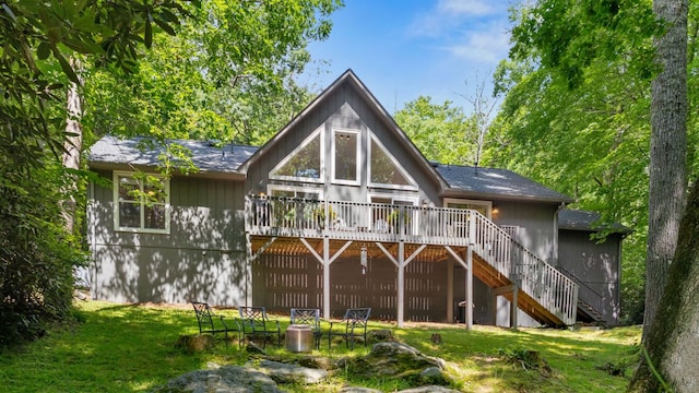 200 Blackberry Trl, Sapphire, NC 28774 - back of house with stairs, a deck, a lawn, and a shingled roof