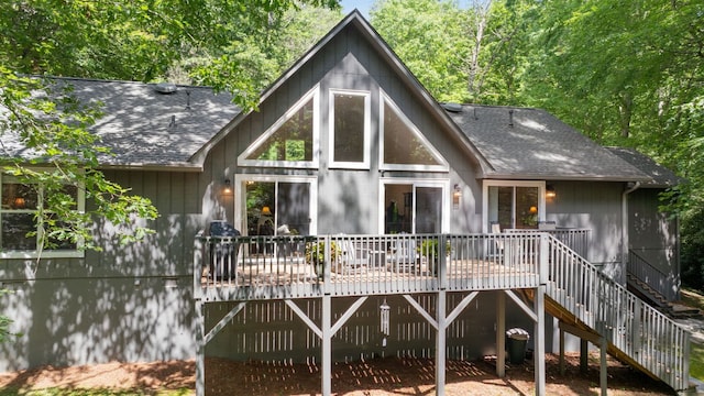 200 Blackberry Trl, Sapphire, NC 28774 - back of property featuring a shingled roof, a wooden deck, and stairway
