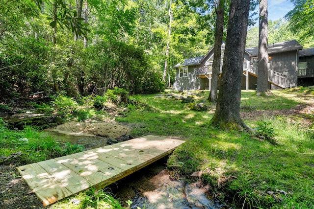 200 Blackberry Trl, Sapphire, NC 28774 - view of yard featuring a deck and stairs