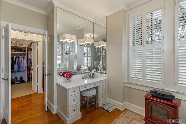 bathroom featuring crown molding and wood-type flooring