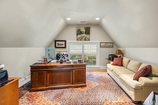 home office featuring vaulted ceiling