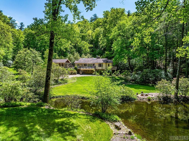 exterior space with a water view