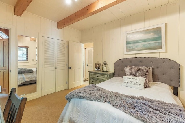 carpeted bedroom featuring beam ceiling and wood walls