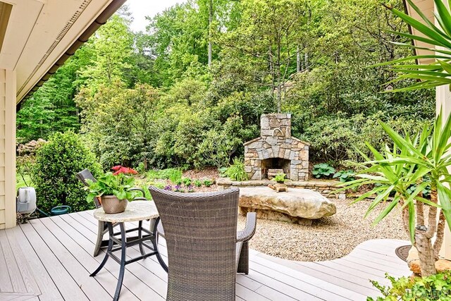 1213 Bull Pen Rd, Cashiers, NC 28717 - deck with an outdoor stone fireplace