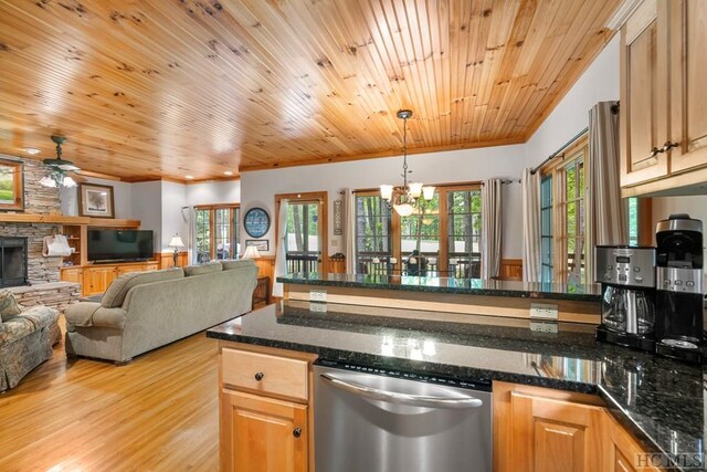 kitchen featuring a stone fireplace, wood ceiling, hanging light fixtures, light hardwood / wood-style flooring, and dishwasher