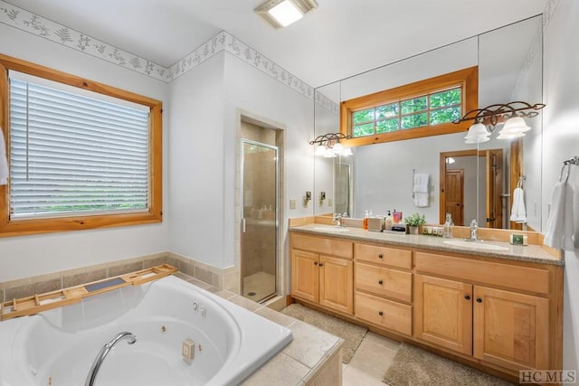 bathroom with vanity and plus walk in shower