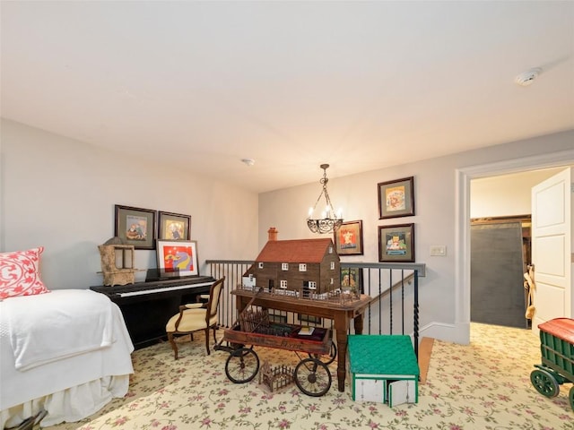 13084 Canada Rd, Tuckasegee, NC 28783 - carpeted bedroom featuring a chandelier