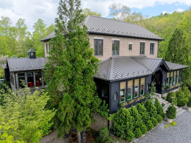 13084 Canada Rd, Tuckasegee, NC 28783 - view of front facade with a standing seam roof and metal roof