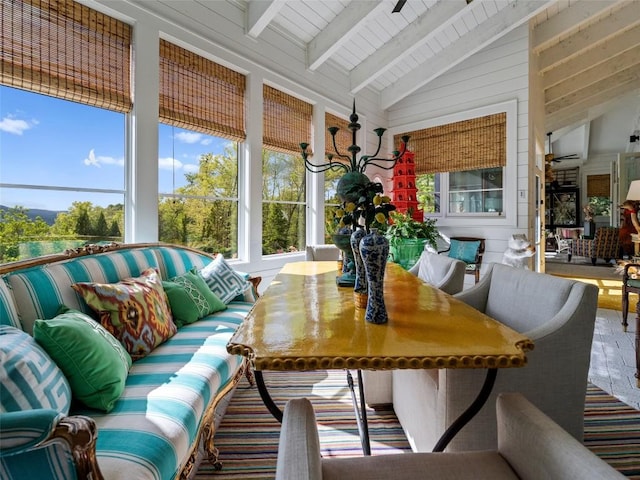 13084 Canada Rd, Tuckasegee, NC 28783 - sunroom featuring plenty of natural light, beamed ceiling, wood ceiling, a wall mounted AC, and high vaulted ceiling