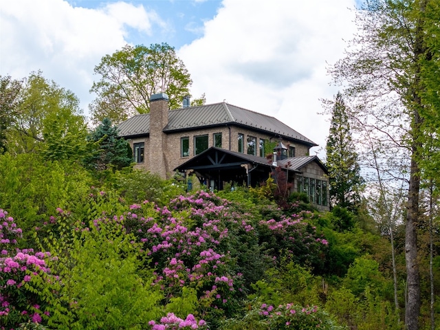 13084 Canada Rd, Tuckasegee, NC 28783 - rear view of property featuring a chimney, metal roof, and a standing seam roof