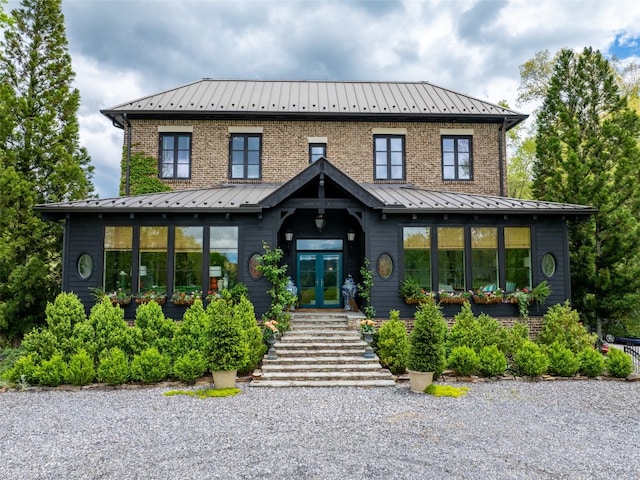 13084 Canada Rd, Tuckasegee, NC 28783 - view of front facade with french doors, a standing seam roof, and metal roof