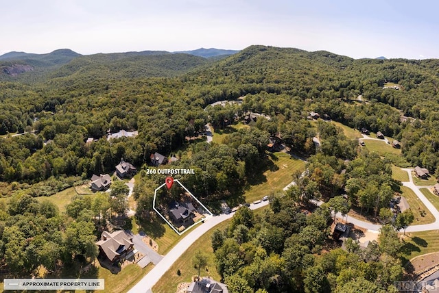 drone / aerial view featuring a mountain view