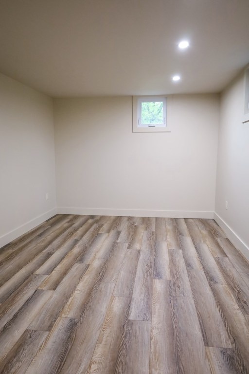 94 Breezy Knob Rd, Franklin, NC 28734 - basement with wood finished floors, recessed lighting, and baseboards
