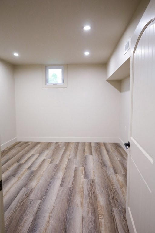 94 Breezy Knob Rd, Franklin, NC 28734 - basement with wood finished floors, recessed lighting, and baseboards