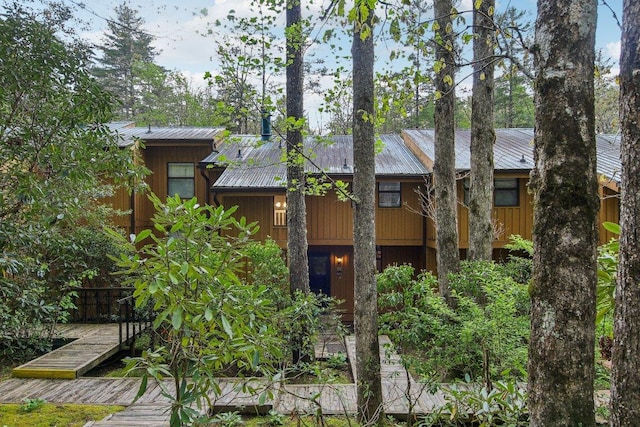 exterior space with metal roof
