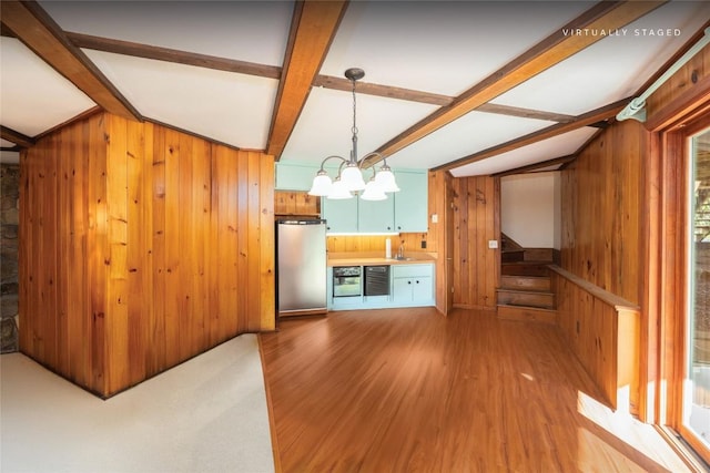 334 Back Nine Ln, Sapphire, NC 28774 - unfurnished living room with wooden walls, wine cooler, beam ceiling, light wood-style flooring, and stairway