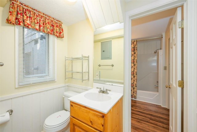 334 Back Nine Ln, Sapphire, NC 28774 - bathroom featuring vanity, electric panel, wainscoting, wood finished floors, and shower / tub combo with curtain