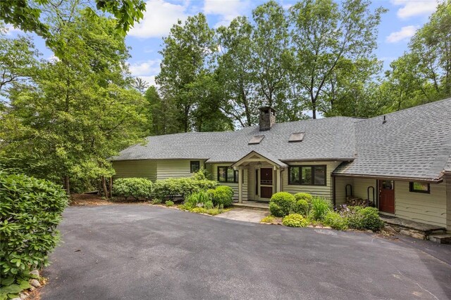 334 Back Nine Ln, Sapphire, NC 28774 - view of front of property featuring a chimney and a shingled roof