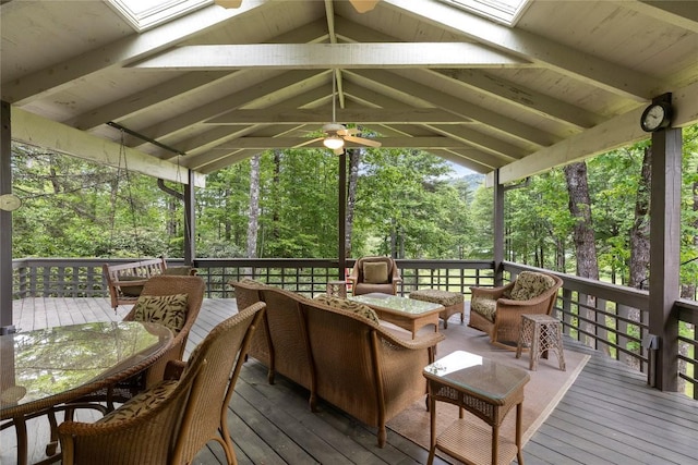 334 Back Nine Ln, Sapphire, NC 28774 - wooden deck featuring an outdoor hangout area, a ceiling fan, outdoor dining space, and view of scattered trees