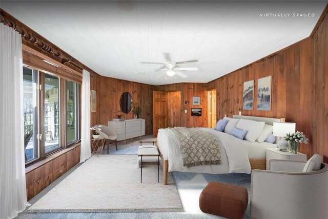 334 Back Nine Ln, Sapphire, NC 28774 - carpeted bedroom with wooden walls and ceiling fan