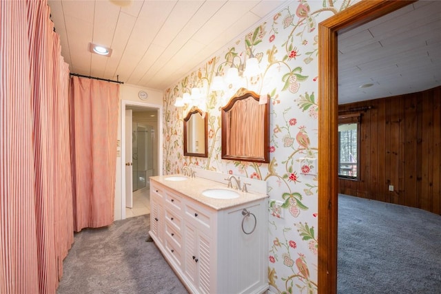 334 Back Nine Ln, Sapphire, NC 28774 - bathroom featuring double vanity, wooden walls, and curtained shower