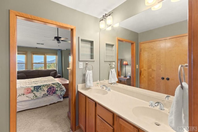 bathroom featuring vanity and ceiling fan