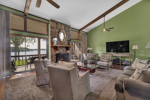 55 Toxaway Shrs Unit 14, Lake Toxaway, NC 28747 - living area featuring ceiling fan, high vaulted ceiling, beam ceiling, a stone fireplace, and wood finished floors