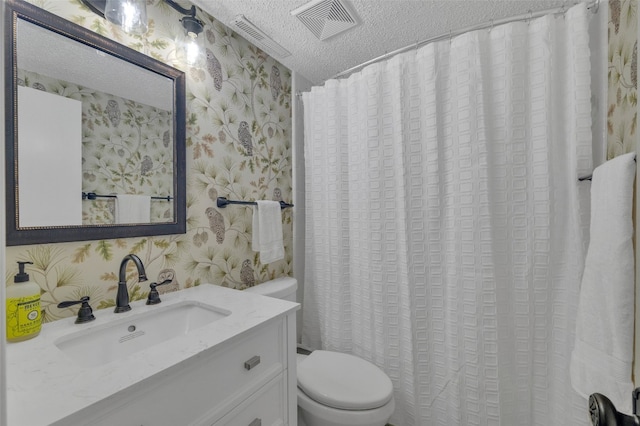55 Toxaway Shrs Unit 14, Lake Toxaway, NC 28747 - bathroom with wallpapered walls, a textured ceiling, and vanity