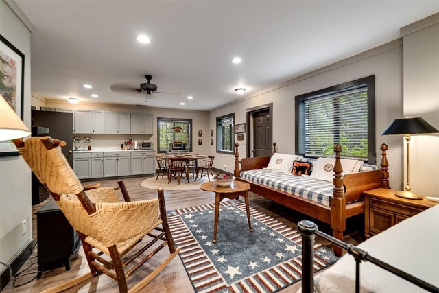 515 Stillmont Cir, Cashiers, NC 28717 - living area with healthy amount of natural light, light wood-style flooring, recessed lighting, ceiling fan, and ornamental molding