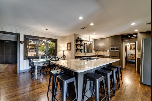 515 Stillmont Cir, Cashiers, NC 28717 - kitchen featuring stainless steel appliances, dark wood-style flooring, open shelves, crown molding, and light stone countertops