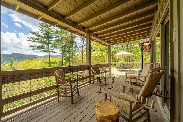 515 Stillmont Cir, Cashiers, NC 28717 - wooden deck featuring outdoor dining space and a mountain view