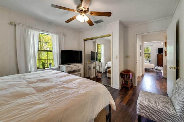 515 Stillmont Cir, Cashiers, NC 28717 - bedroom featuring ornamental molding, dark wood-type flooring, a closet, and ceiling fan
