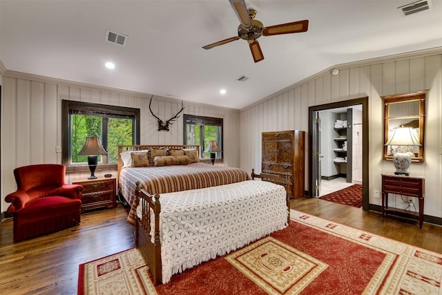 515 Stillmont Cir, Cashiers, NC 28717 - bedroom featuring vaulted ceiling, wood finished floors, crown molding, a ceiling fan, and baseboards