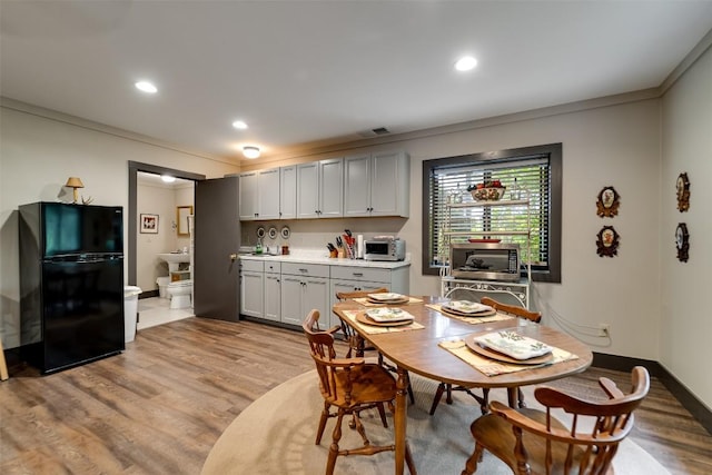 515 Stillmont Cir, Cashiers, NC 28717 - dining space featuring light wood-style floors, recessed lighting, crown molding, and baseboards