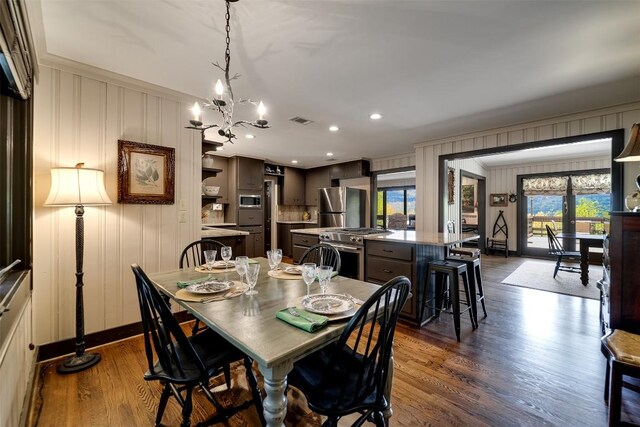 515 Stillmont Cir, Cashiers, NC 28717 - dining room with crown molding, dark wood-type flooring, a chandelier, baseboards, and recessed lighting