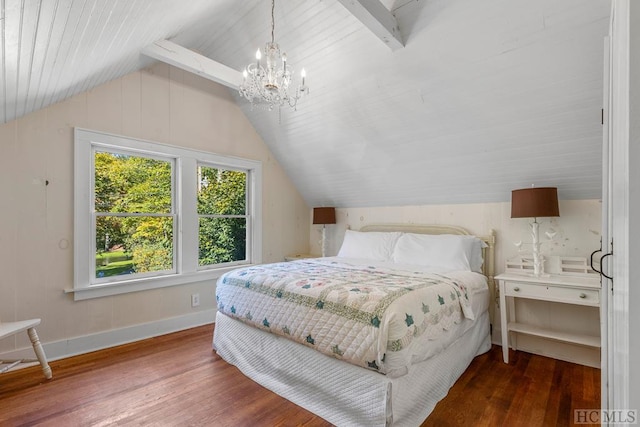 bedroom featuring hardwood / wood-style flooring, a chandelier, and vaulted ceiling