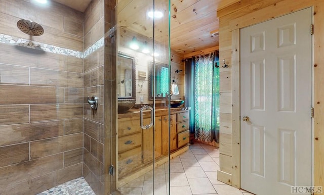 bathroom featuring vanity, an enclosed shower, tile patterned flooring, and wooden ceiling