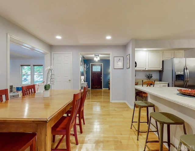 dining area featuring light hardwood / wood-style flooring