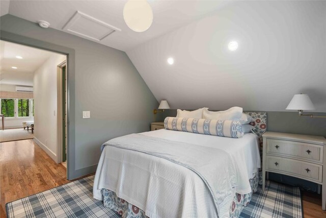 358 Jodytown Rd, Cashiers, NC 28717 - bedroom with lofted ceiling, attic access, wood finished floors, recessed lighting, and baseboards