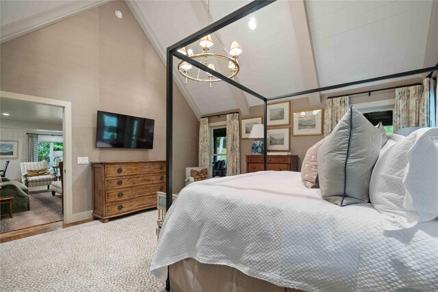 358 Jodytown Rd, Cashiers, NC 28717 - bedroom featuring high vaulted ceiling, a chandelier, baseboards, and wood finished floors