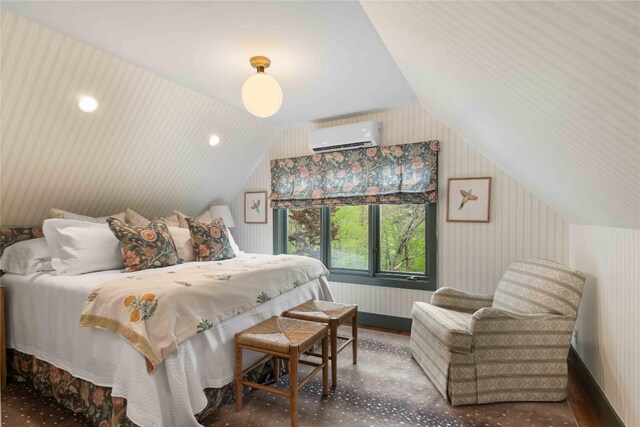 358 Jodytown Rd, Cashiers, NC 28717 - bedroom featuring a wall mounted AC, vaulted ceiling, radiator, and wood finished floors