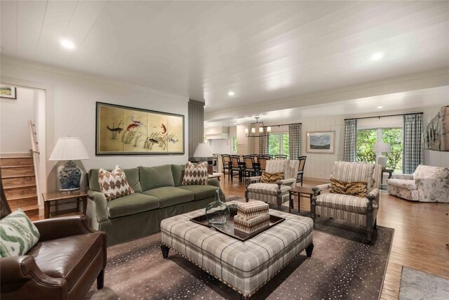 358 Jodytown Rd, Cashiers, NC 28717 - living area with wood finished floors, stairs, recessed lighting, a chandelier, and crown molding