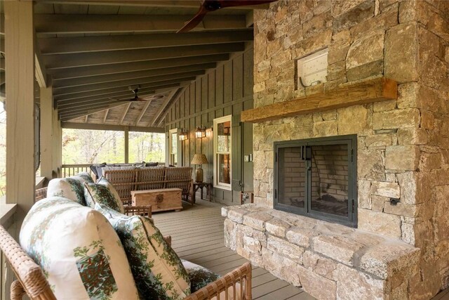 358 Jodytown Rd, Cashiers, NC 28717 - sunroom with a ceiling fan, an outdoor living space with a fireplace, and lofted ceiling
