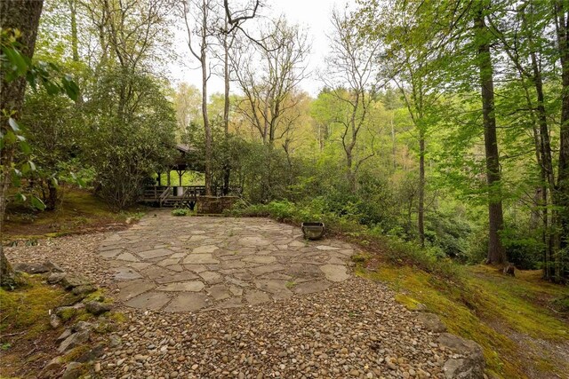 358 Jodytown Rd, Cashiers, NC 28717 - view of patio / terrace featuring a view of trees