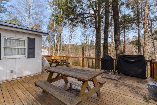 wooden deck with area for grilling