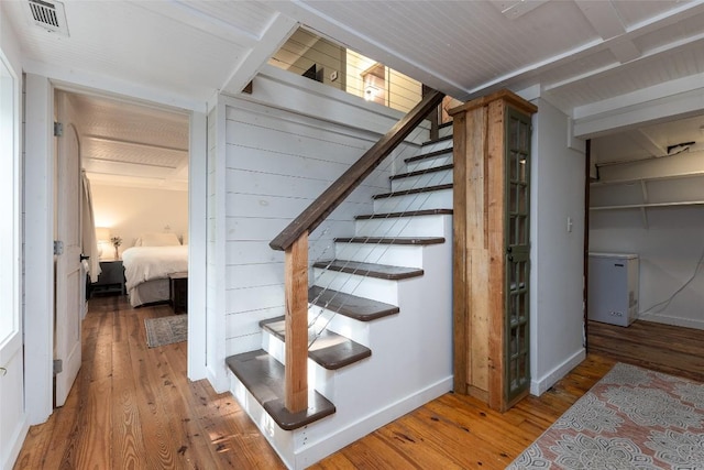 4860 Horse Cove Rd, Highlands, NC 28741 - staircase featuring wood-type flooring